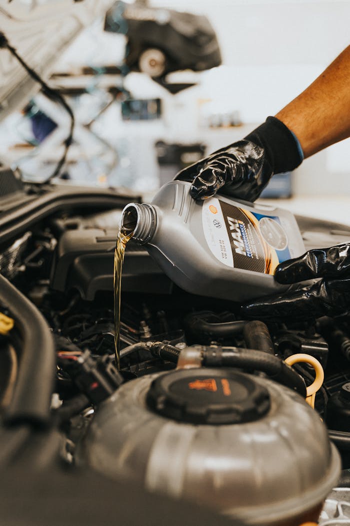 Diesel mechanic working on truck repairs for Power Diesel Road Services, ensuring safe and efficient roadside assistance.